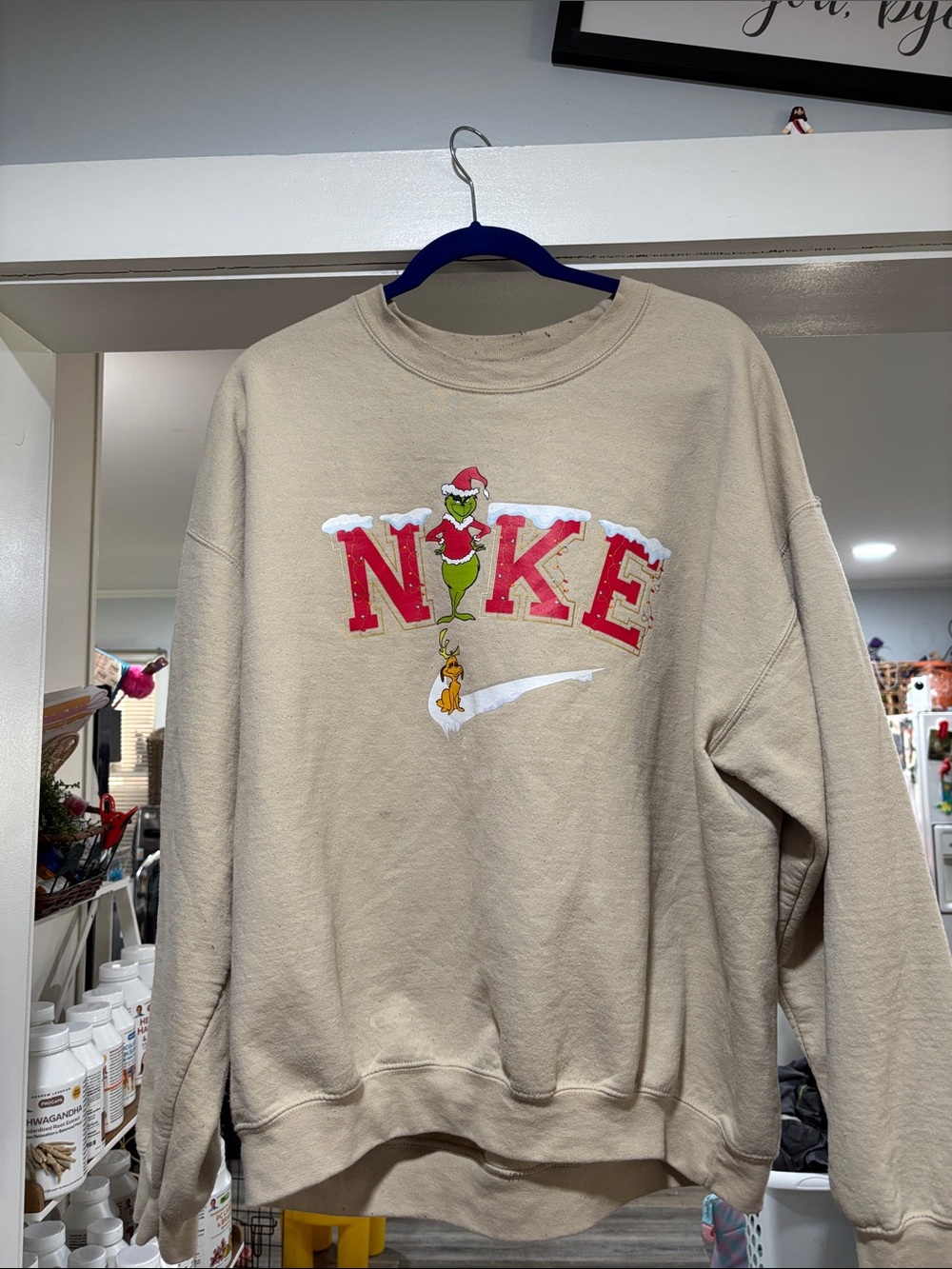 Nike Tan Crewneck Sweatshirt with Grinch Holiday Graphic